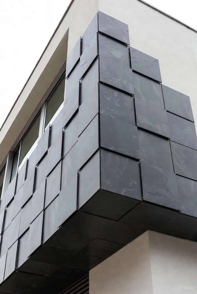 Basalt exterior paving with marble edge trim