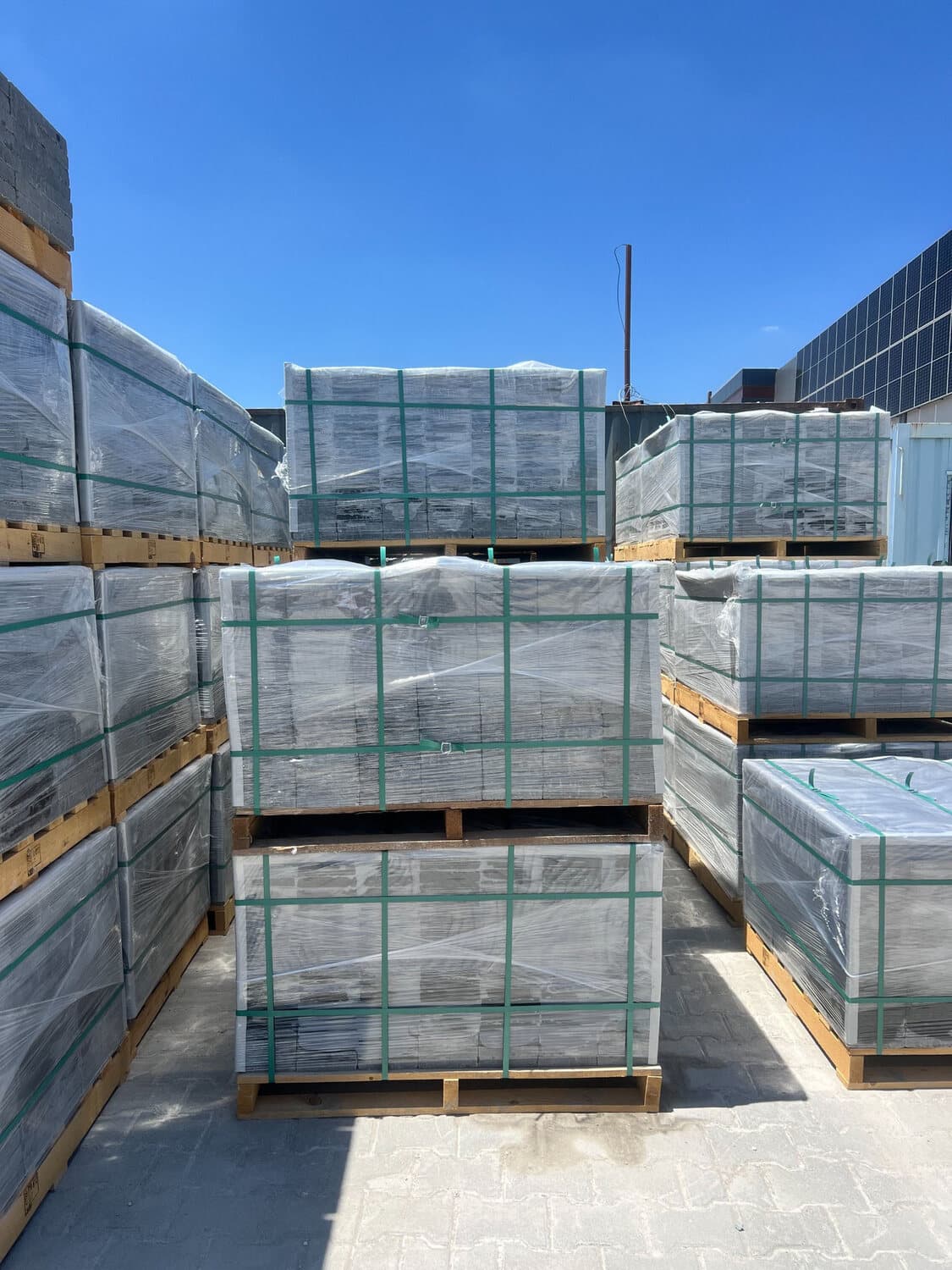 Shrink-wrapped, strapped export pallets