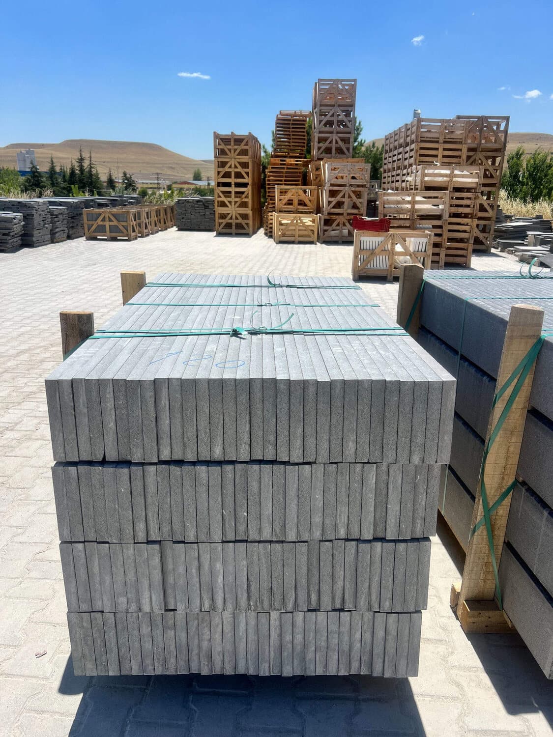 Strapped basalt bundles ready to load