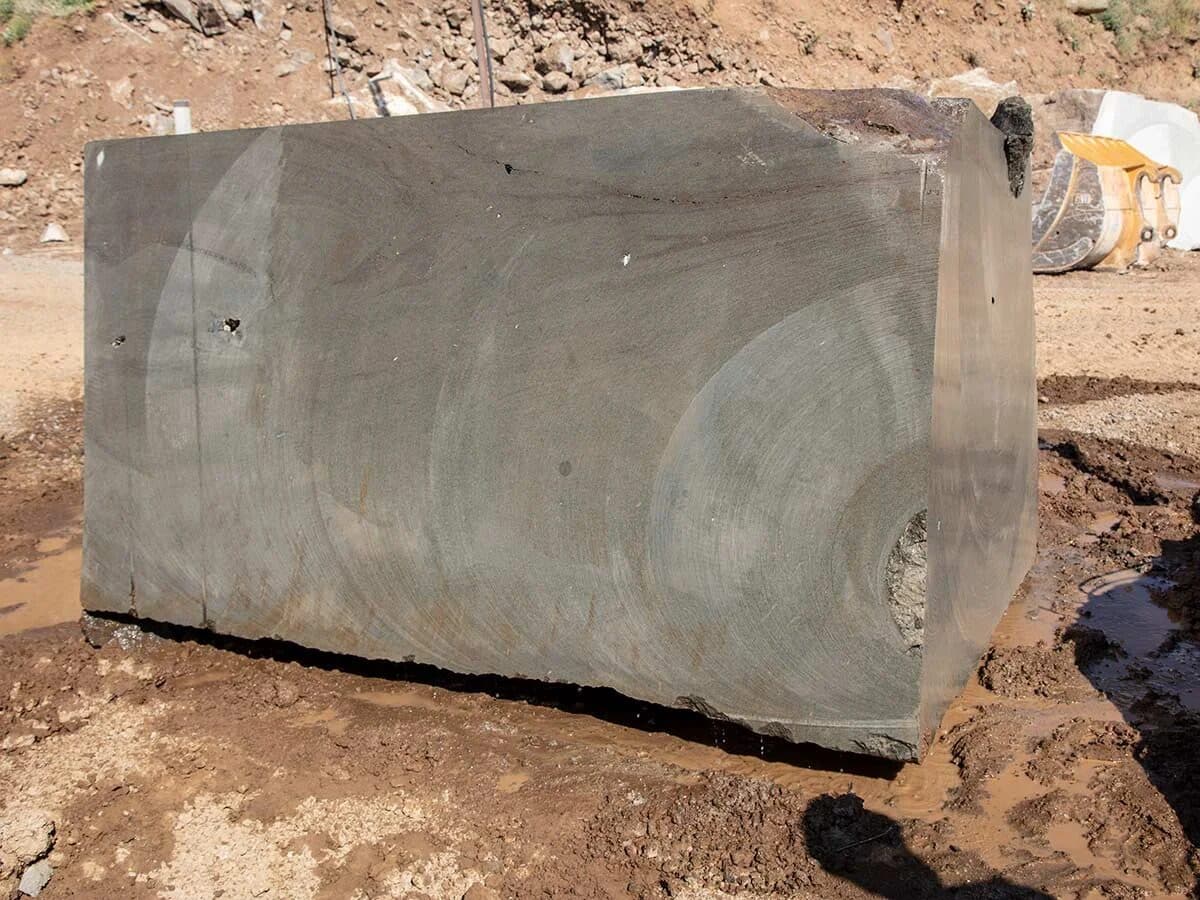 Close-up of a cut basalt block with saw-mark texture